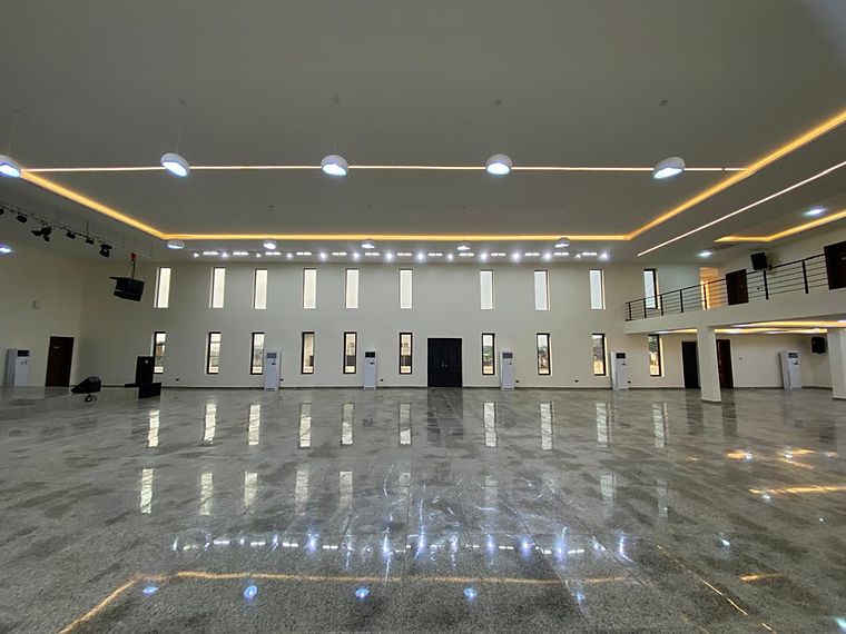 Completed hall with concealed lighting and ceiling mounted air conditioning